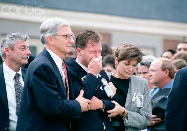November 1994: David Smith, father of Michael and Alexander, leaves the church after the funeral for his two sons. Photo:  Greg Smith/Corbis SABA.