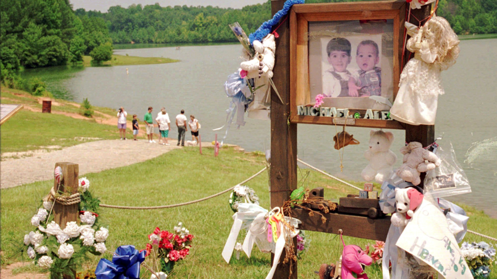 July 9, 1995: Visitors walk down the Union, South Carolina boat ramp where Alex and Michael Smith drowned in 1994. AP Photo/Lou Krasky, File.