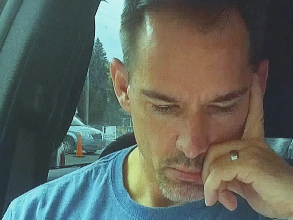 Lloyd Neurauter speaking with investigators on camera, days after he had already staged his ex-wife's murder as a suicide. Photo: CBS News.