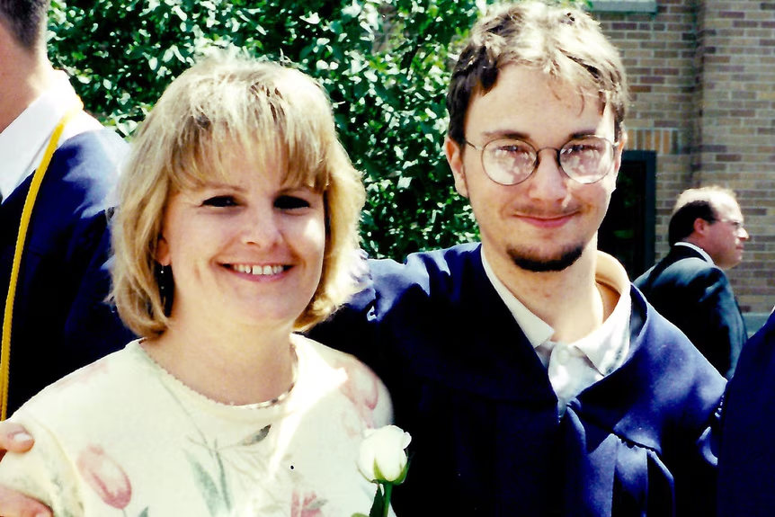 Dustin Wehde, right, pictured before his death at age 20 on December 13, 2001.