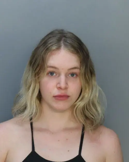 Courtney Clenney, arrested in Hawaii, August 2022, charged with second-degree murder with a weapon in the death of Christian Obumseli. Miami Dade Corrections and Rehab.