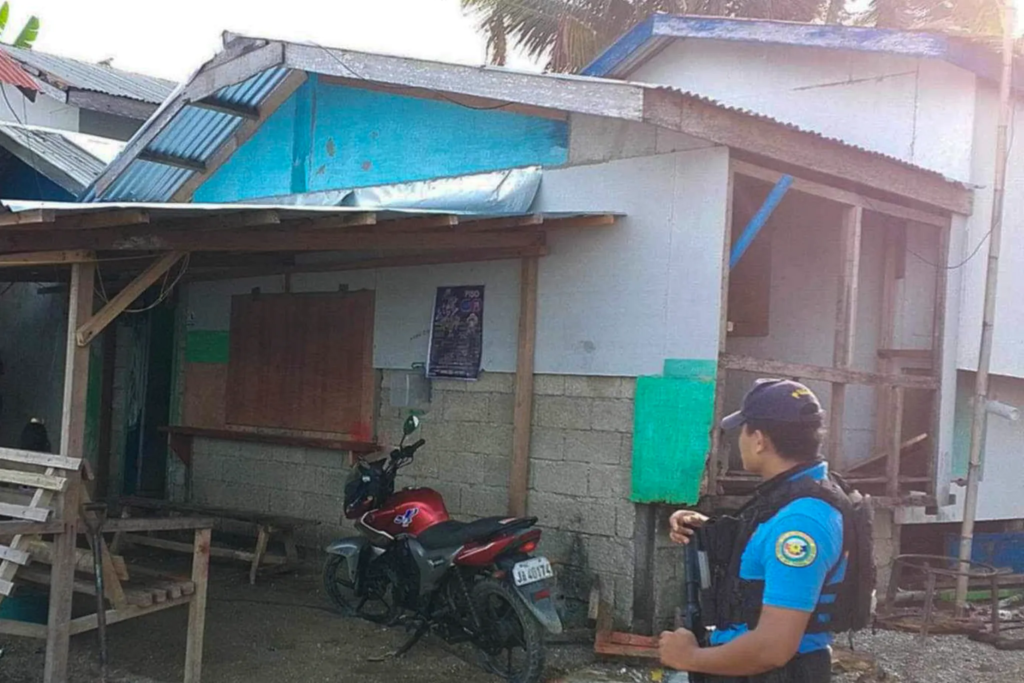 Philippine National Police examine the crime scene outside Eastman's home in Sibuco, Zamboanga del Norte, October 18, 2024. Photo: AP