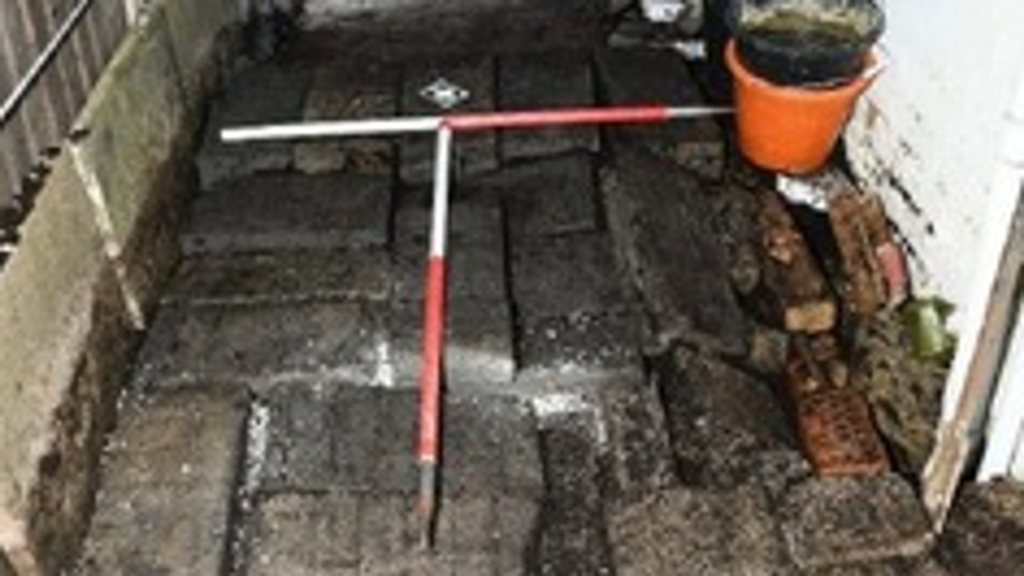The side return of Fiona Beal's Moore Street garden, Northampton, where Nicholas Billingham's body was found buried in March 2022. Credit: Northamptonshire police.