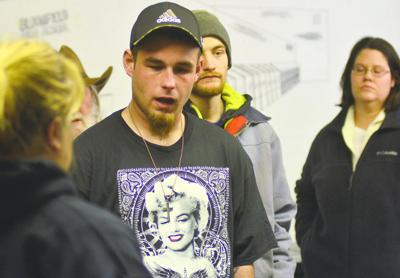 Douglas "D.J." Lockhart, 22, speaks at a candlelight vigil for Marina Boelter at Bloomfield Town Park on January 9, 2015. He would be stabbed to death five weeks later.
