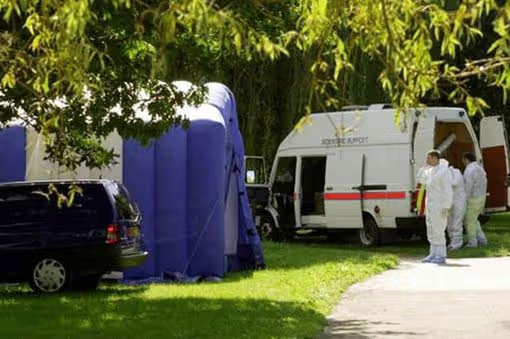 How Michael Chidgey Murdered Heather Tell and Was Exposed by His Own Family 3 Staffordshire Police forensic officers at the crime scene in Kettlebrook Linear Park, Tamworth, August 2000. The blue forensic tent was erected over Heather Tell's body to prevent further evidence degradation from overnight rainfall.