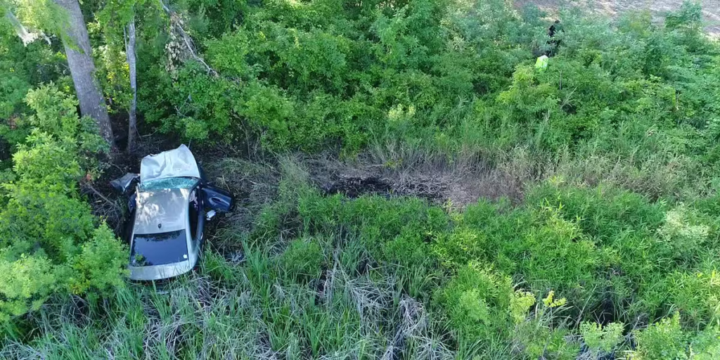 Stephanie Mayorga and Paige Escalera Disappeared in Seconds. Their Car Sat in the Woods for Nineteen Days. 4 Drone footage captured Paige Escalera's grey 2013 Dodge Dart deep in the wooded area off River Road, near Watermark Marina in Wilmington, North Carolina, on May 4, 2020, nineteen days after the crash. The vehicle was invisible from ground level. From the air, it was not.