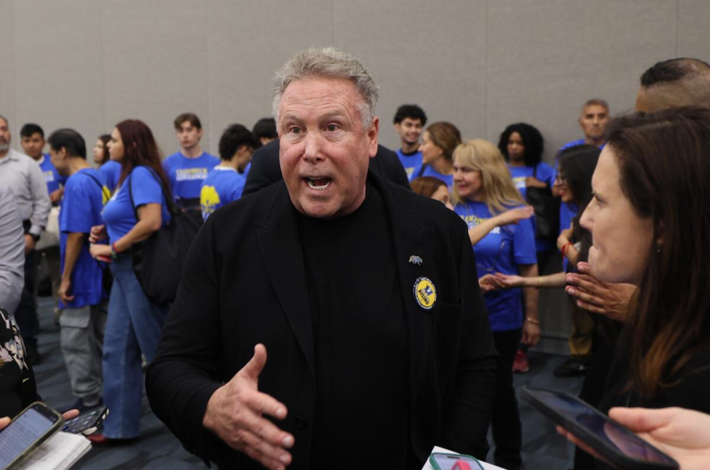 Stephen Cloobeck speaks to reporters during his 2025 California gubernatorial campaign. Cloobeck spent $1.4 million on TV ads before dropping out of the race. He has since pleaded not guilty to three felony witness tampering charges. Myung J. Chun / Los Angeles Times.