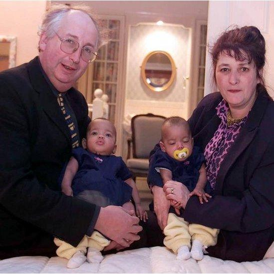 Alan and Judith Kilshaw with twins Kiara and Keyara, December 2000. The photo was taken shortly after the couple completed the adoption through an Arkansas court hearing that lasted just five minutes.