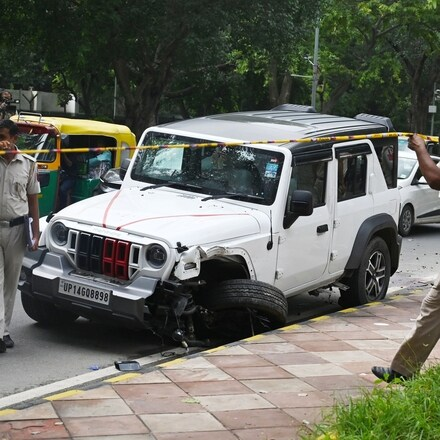 How Oluwadamilola Bamigboye Shouted "Drive" in a Plymouth Parking Lot, Trapped a Federal Agent in a Moving Jeep at Gunpoint, and Ended Up in Federal Court 4 A damaged white Mahindra Thar SUV with license plate UP14G08898 under police examination in Delhi, India, after the vehicle struck two people. LSD and cocaine were recovered from inside the car.